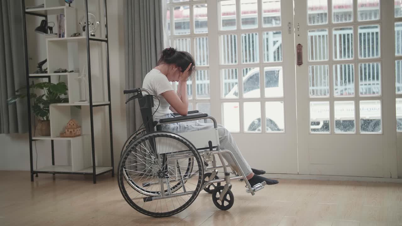 Woman in Wheelchair Feeling Sad