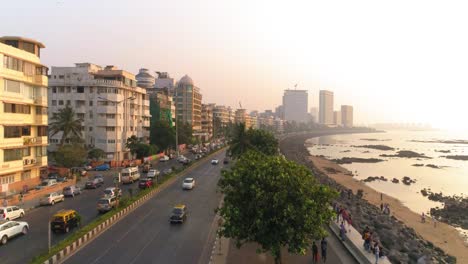 drone shots of the most iconic walkway of south bombay, marine drive, also known as the queen's necklace as seen before the great mumbai coastal road is made