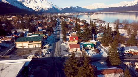 4K-Drone-Video-of-Homes-in-Seward,-Alaska-on-a-Snowy-Winter-day