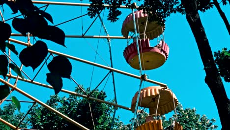 ferris wheel over blue sky