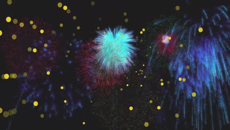 animation of yellow spots of light over blue new year fireworks exploding in night sky