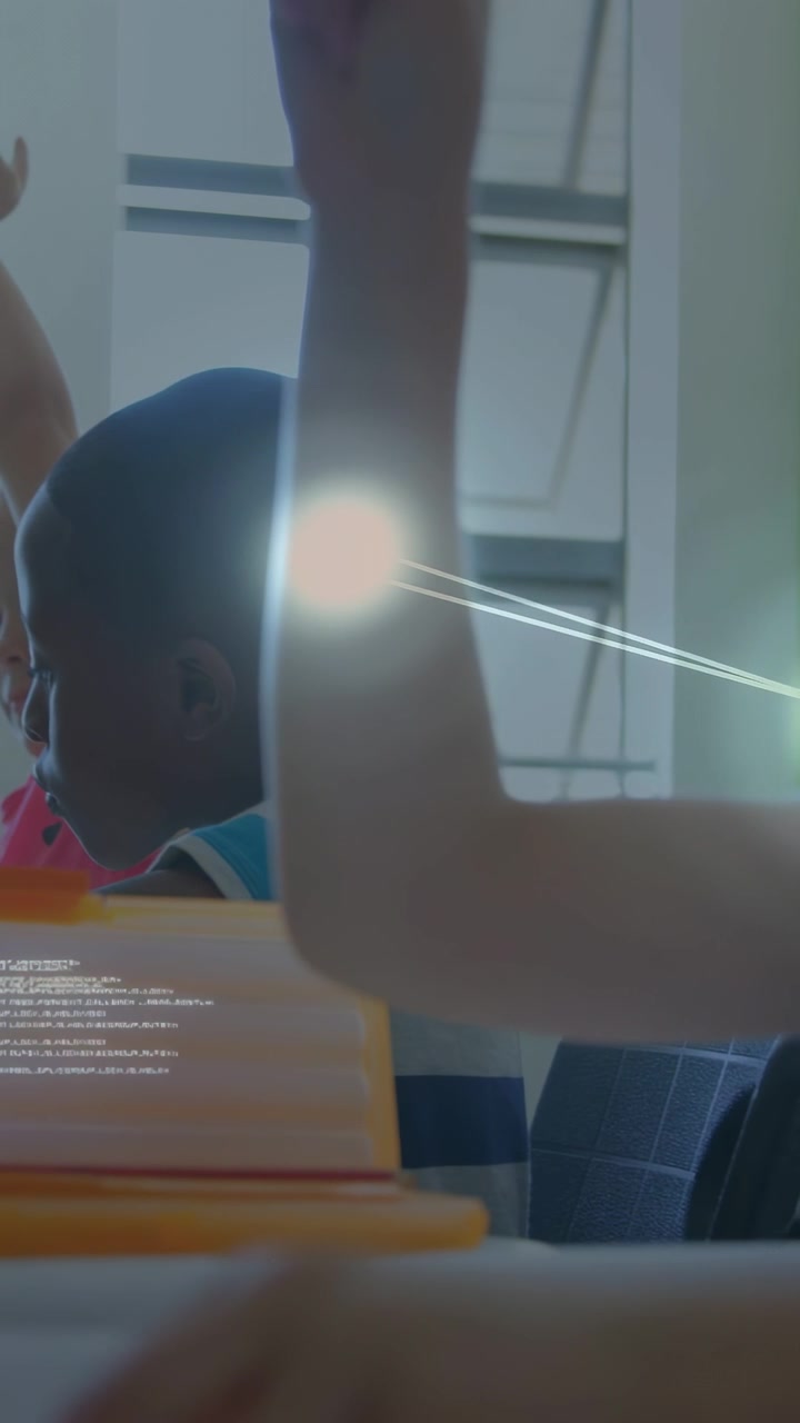 Vertical video: Class raising hands, arm rising causing nodes linking on arms, answering