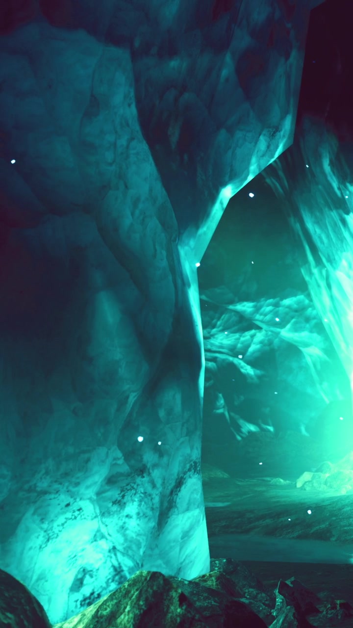 Light shines through ice cave with glowing rocks and dark walls