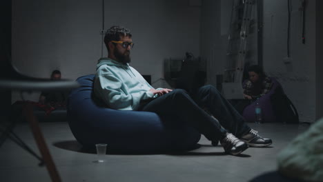 nighttime meeting in a shared workspace