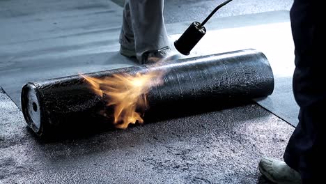 builders waterproofing floor area with people stock footage stock photo