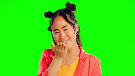 Face,-woman-and-blowing-kiss-on-green-screen