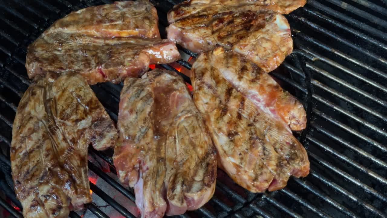 Cooking lamb chops on a barbecue