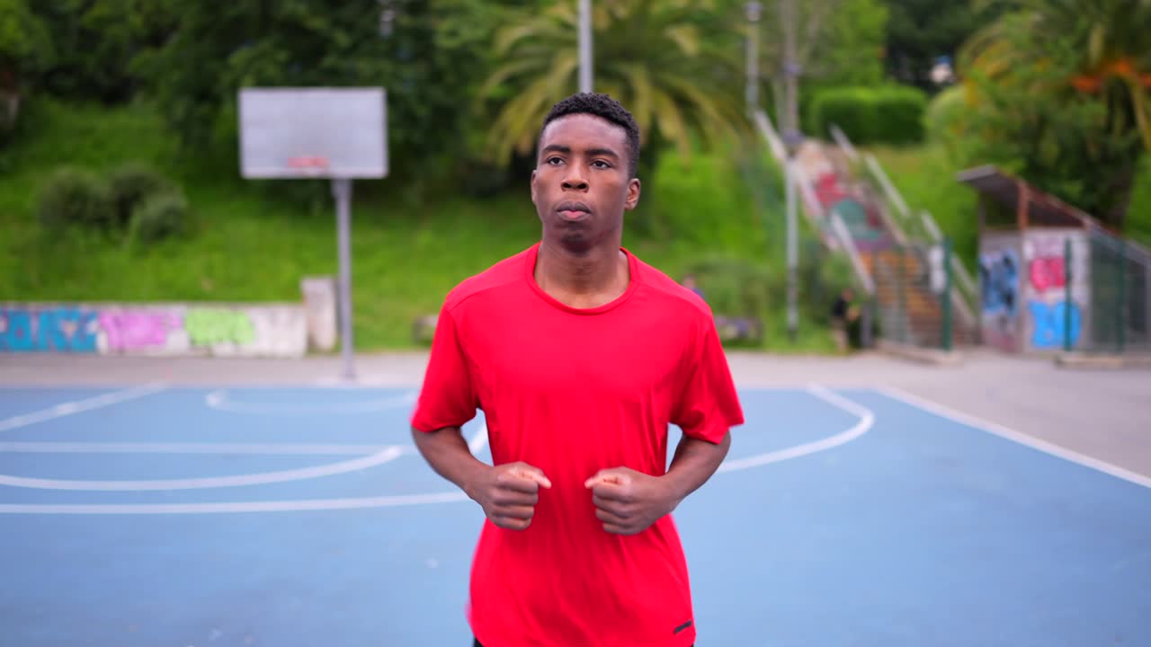 Man exercising on a basketball court