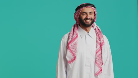 middle eastern guy in traditional wear