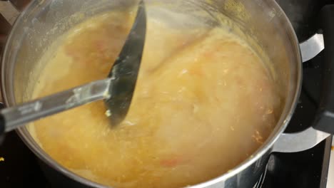 Slow-motion-of-cooking-dhal-in-hot-water