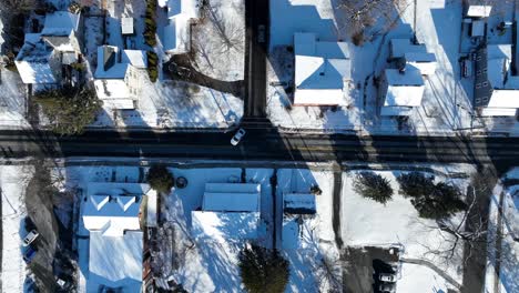 Aerial-overhead-birds-eye-view-of-a-snow-covered-landscape