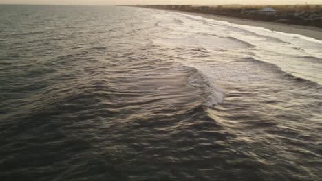 Extreme-wide-shot-of-beach-sunset-over-the-ocean