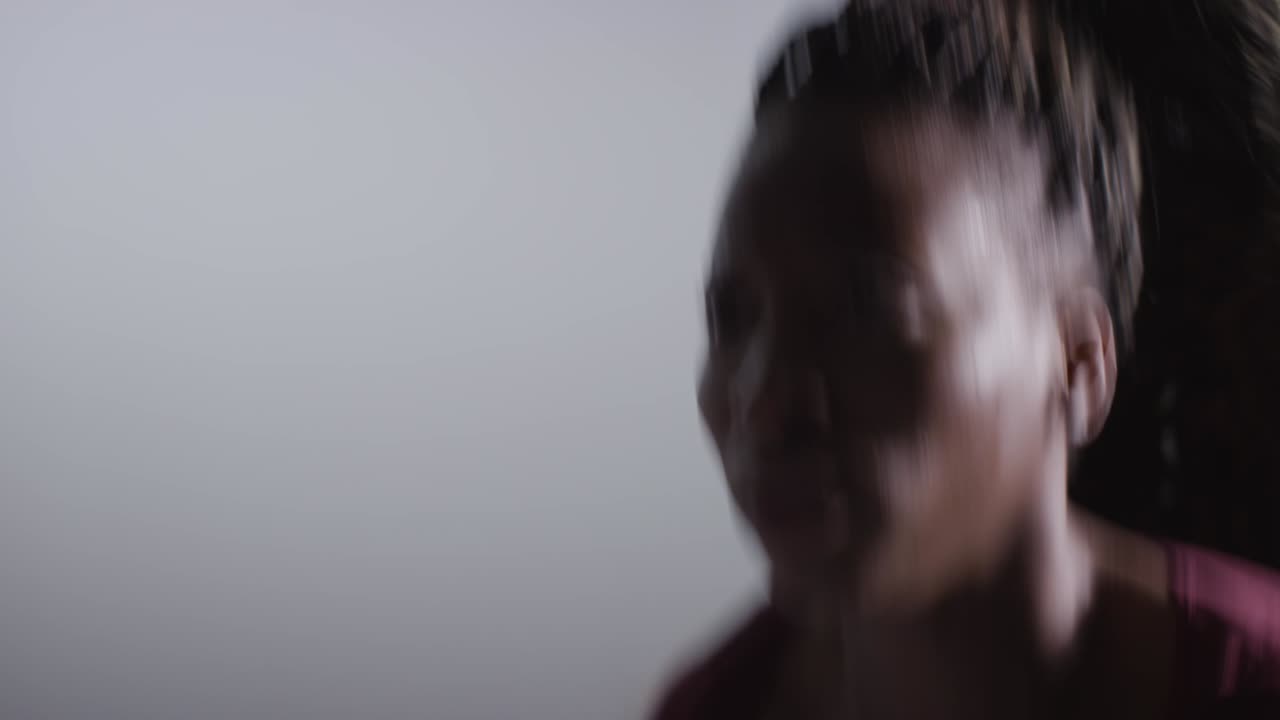 Studio Shot Of Two Women Wearing Gym Fitness Clothing Hugging And Giving High Fives After Exercising 3