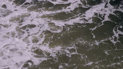 close up of waves rolling over on waves in myrtle beach