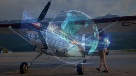 animation of spinning globe over caucasian male pilot inspecting the airplane at an airport