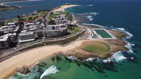 newcastle canoe pool with newcastle ocean baths in nsw, australia - aerial shot