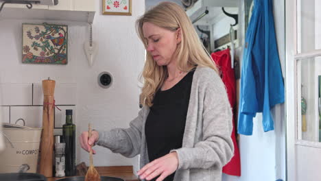 woman cooking in kitchen