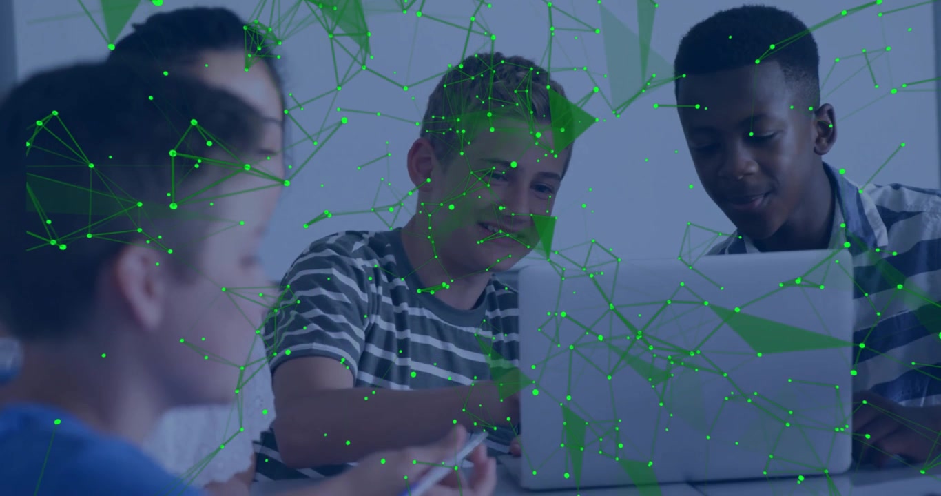 Group of children collaborating around laptop in classroom, with floating tech network graphics
