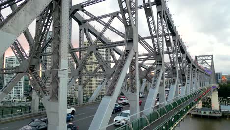 zoomed drone footage of the story bridge at sunset in brisbane, queensland australia