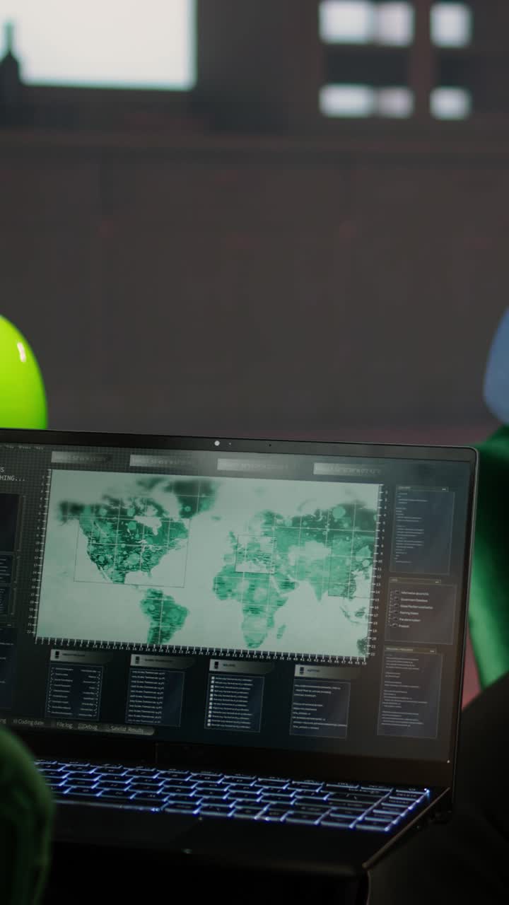 Laptop Screen Displaying World Map with Digital Data Interface