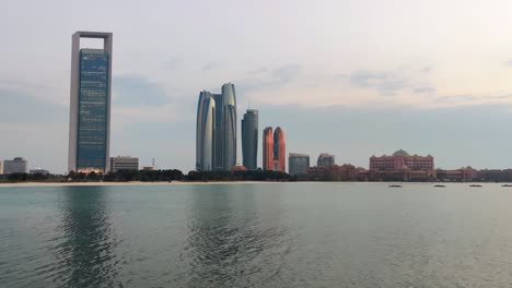 abu dhabi city corniche beach - etihad towers - nation towers - emirates palace | landmarks and tourist attractions - middle east travel