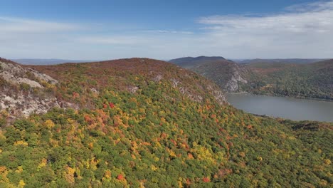 An-aerial-view-above-the-mountains-in-upstate-NY-during-the-fall-season