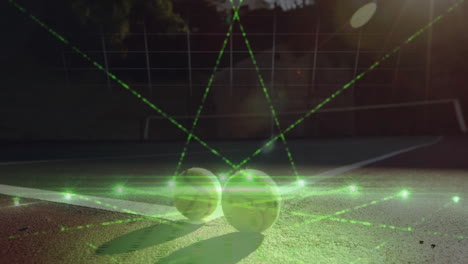 pair of tennis balls being shown on gritty court, green lasers crisscrossing overhead in 3d scene