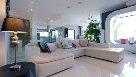 revealing shot of a modern living room within a mansion in st gely du fresc