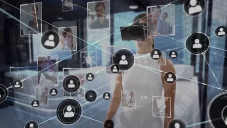 animation of network of connections with icons and photographs over businesswoman wearing vr headset