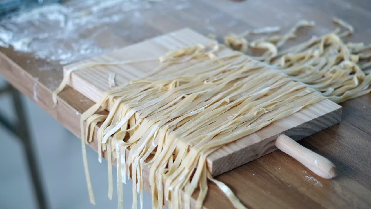 Chef's Flour-Coated Tagliatelle Sorting in Cinematic Slow Motion - Culinary Masterpiece - 4K