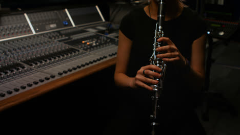 woman playing a clarinet