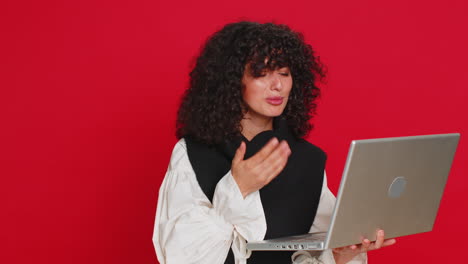 Displeased woman use laptop surprised by bad news fortune loss play game fail lottery results