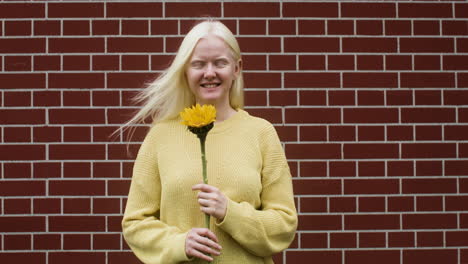 smiling girl with flower