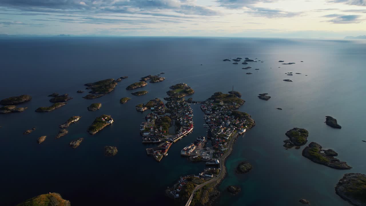 Iconic football field in Henningsvær, Lofoten, Norway. Coastal village, scenic aerial landscape footage