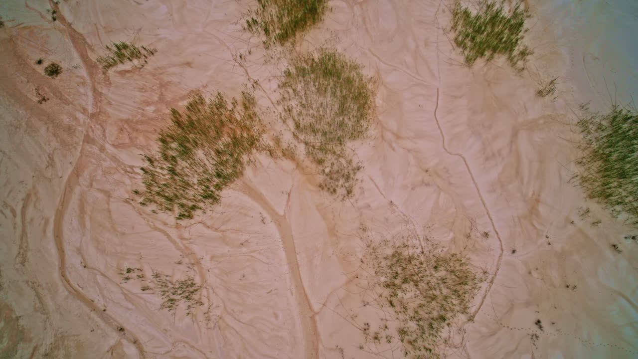 Drone shot looking at the aftermath of mining on the landscape