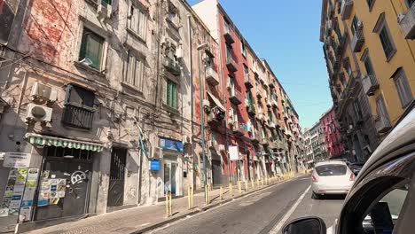 car driving through a colorful naples street