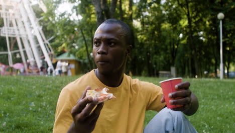 happy man on a picnic at the park