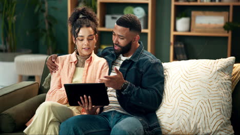 couple using tablet at home