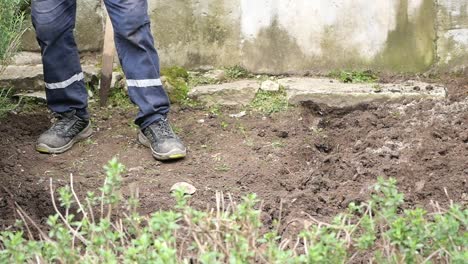 gardener digging soil
