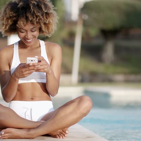 Woman-Resting-And-Texting-On-A-Smart-Phone