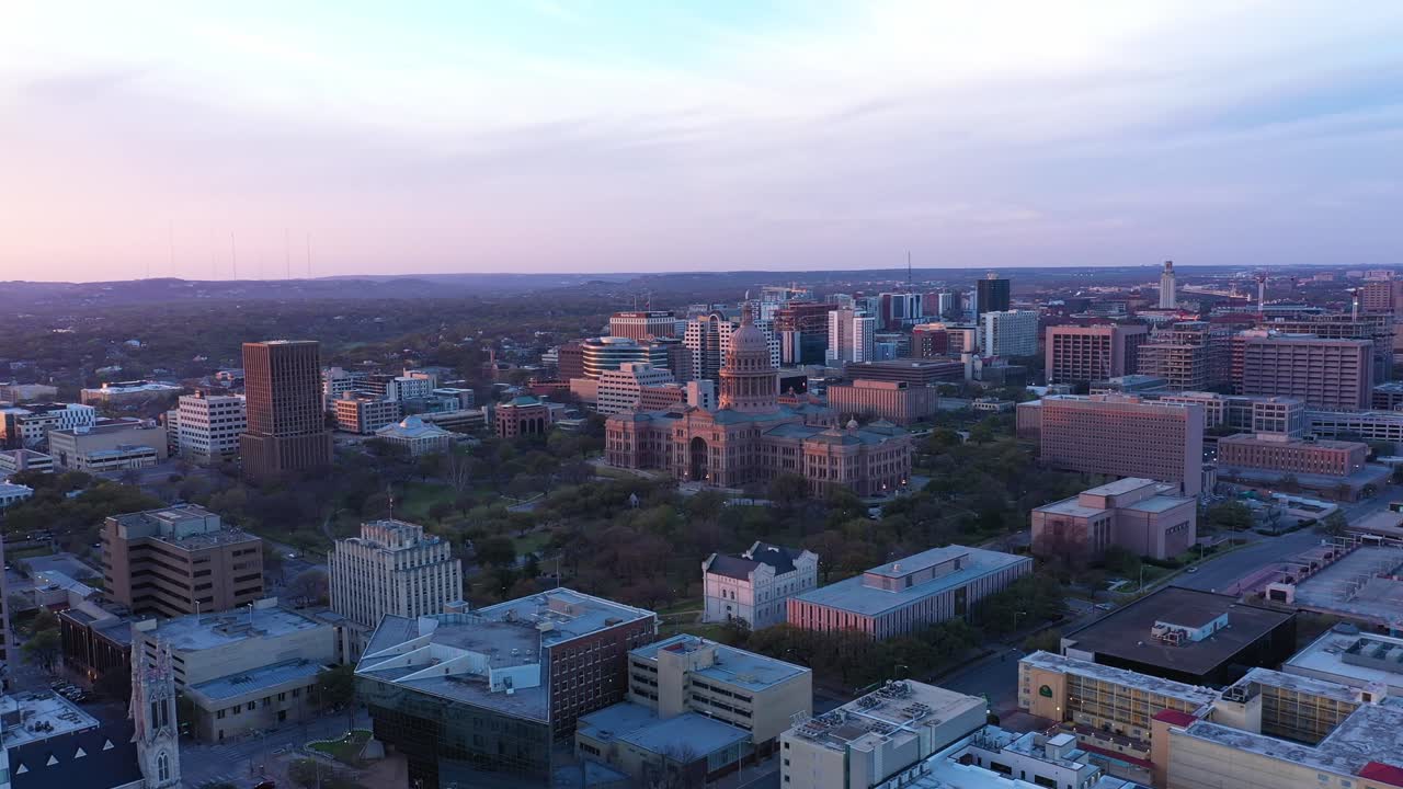 Drone 360 view at the capital building while the sun is setting