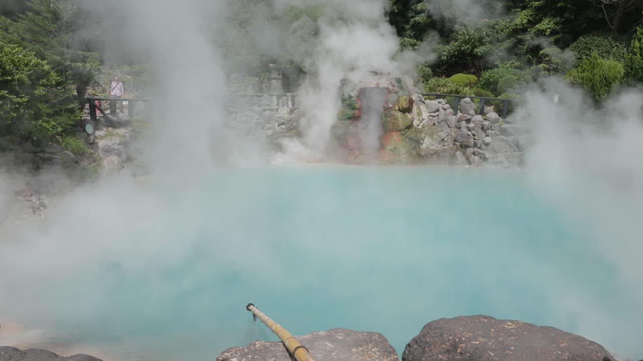 Steam going up from turquoise water in Beppu Hells, Japan