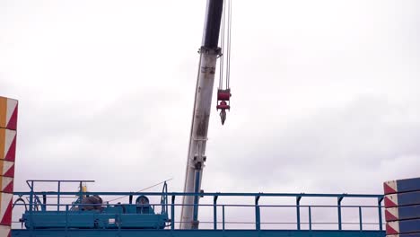 construction site with crane and workers