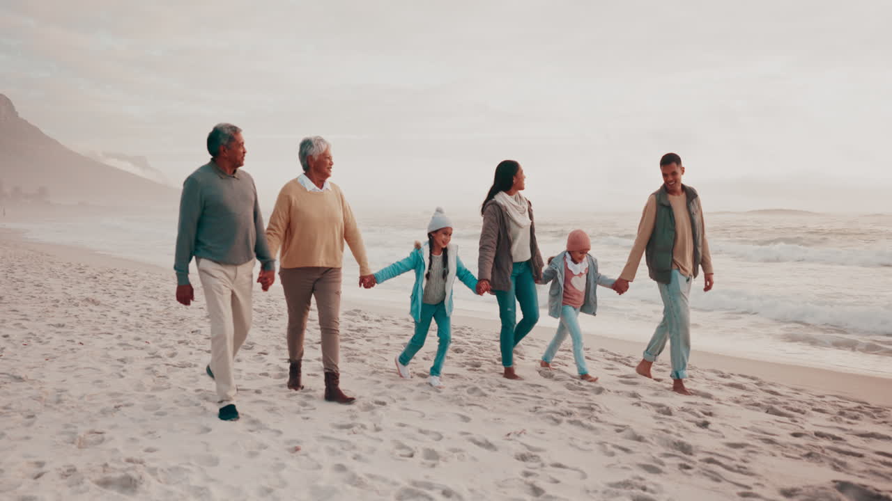 Grandparents and Grandkids Enjoying a Winter Beach Walk