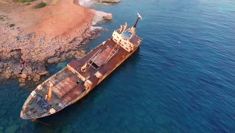 aerial shot from edro iii shipwreck in cyprus, from close up to wide angle