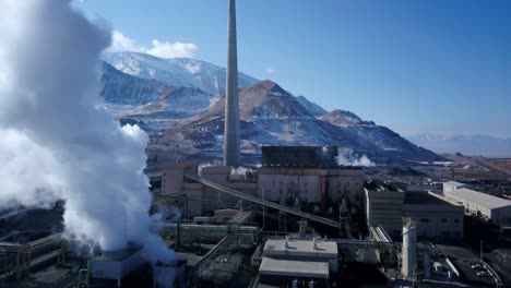 Aerial-morning-fly-over-the-Kenicott-Cooper-Mine-factory-in-Magna,-UT