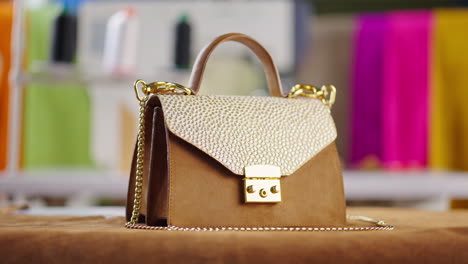elegant brown and gold handbag