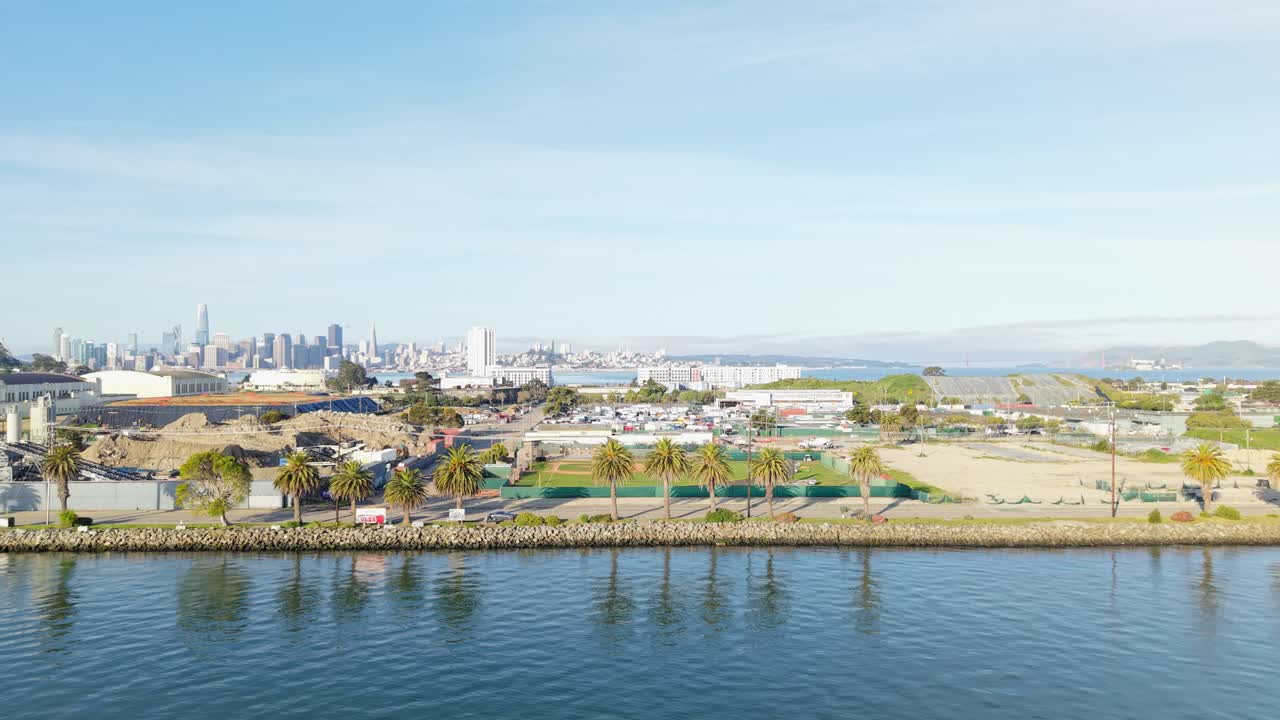 A quiet slice of land in the middle of the Bay, Treasure Island’s urban solitude is captured in a soft golden light.