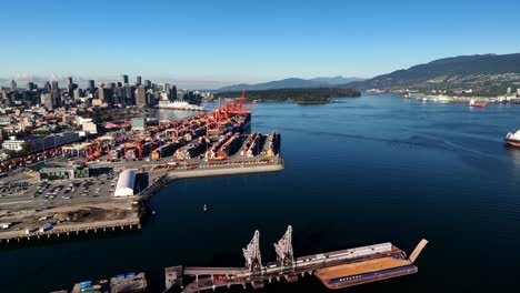 centerm container terminal next to sand and gravel industry on burrard inlet shore, vancouver, canada