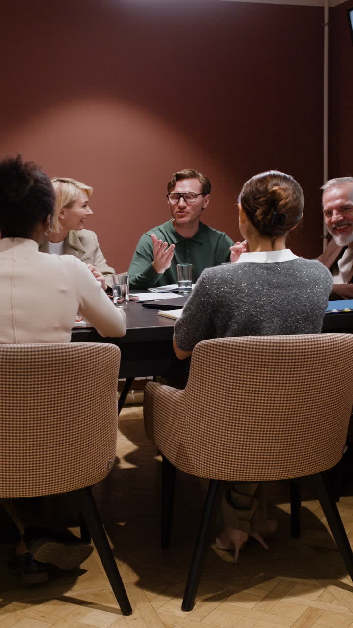 Diverse Business Professionals Collaborating in a Meeting